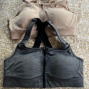 Two zip front high impact sports bras from Duluth Trading.